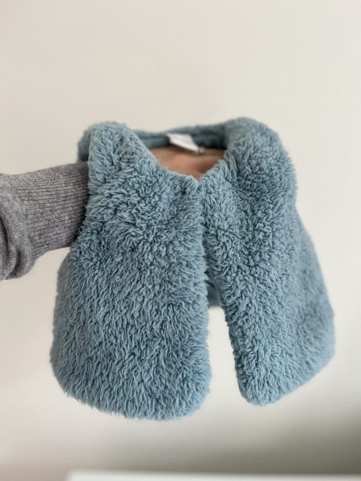 Blue fluffy vest